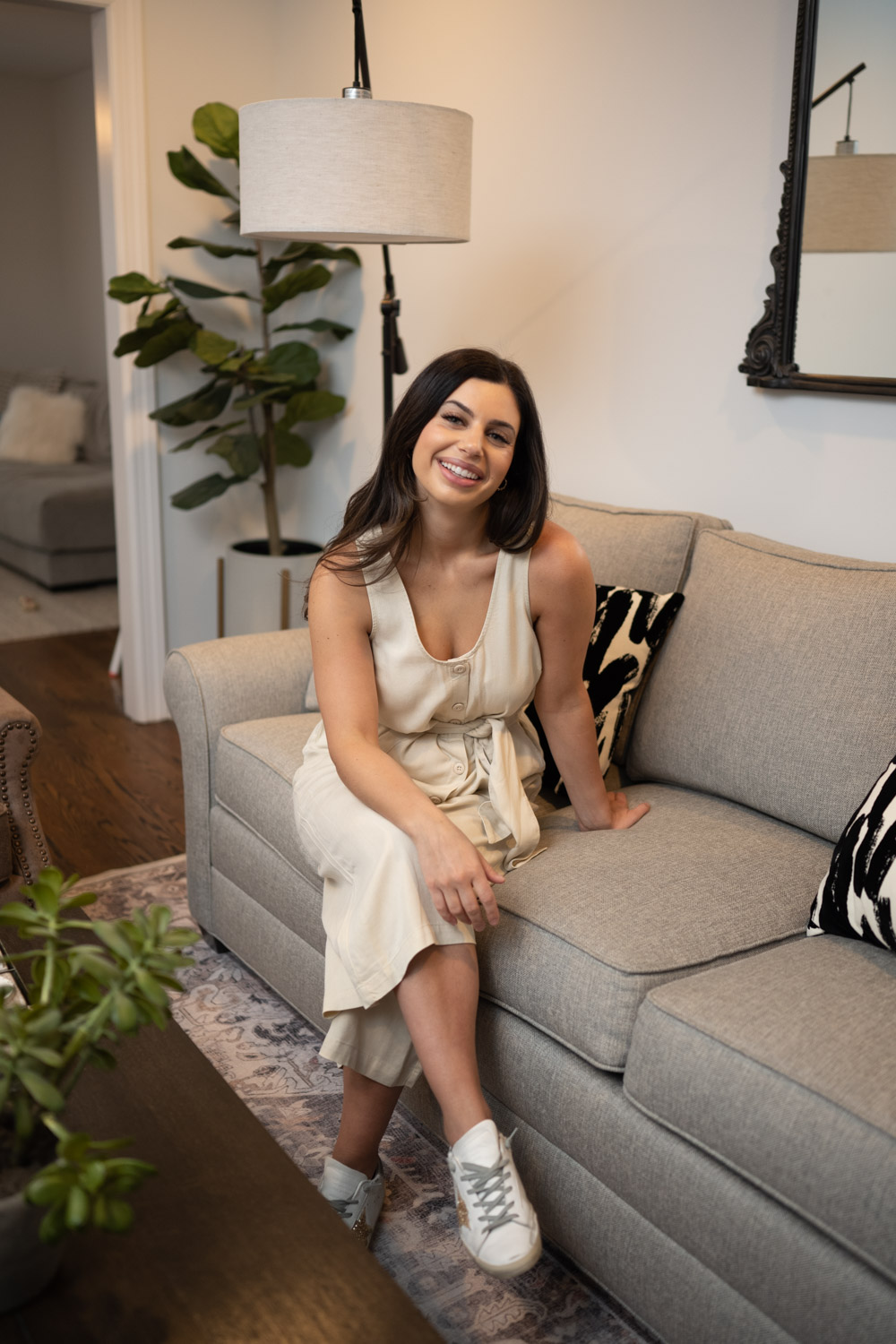 Tara Nicole Styled outdoors in a cream dress